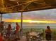 Stunning ocean sunset view from a beachfront restaurant patio at 13153 Steinhatchee Loop, Venice, FL 34293