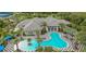 Aerial view of resort-style pool with a large deck and lounge area at 13153 Steinhatchee Loop, Venice, FL 34293