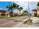 Scenic street view with shops and palm trees at 13153 Steinhatchee Loop, Venice, FL 34293