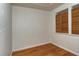 Simple bedroom with hardwood floors and window at 1320 Cocoanut Ave, Sarasota, FL 34236