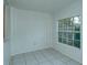 Bright bonus room with tile floors and window at 1320 Cocoanut Ave, Sarasota, FL 34236