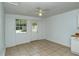 Dining area with tile floor and door to backyard at 1320 Cocoanut Ave, Sarasota, FL 34236