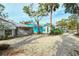 House exterior, gravel driveway, and neighboring houses at 1320 Cocoanut Ave, Sarasota, FL 34236