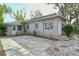 Exterior view of the house with a concrete patio at 1320 Cocoanut Ave, Sarasota, FL 34236