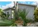 Side view of house showing stucco exterior at 1320 Cocoanut Ave, Sarasota, FL 34236