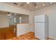 Kitchen with white appliances and terracotta floor at 1320 Cocoanut Ave, Sarasota, FL 34236