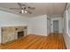 Living room featuring hardwood floors and fireplace at 1320 Cocoanut Ave, Sarasota, FL 34236