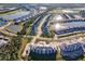 Aerial view of community and surrounding landscape at 14191 Heritage Landing Blvd # 1244, Punta Gorda, FL 33955