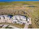 Aerial view of building and waterfront property at 14191 Heritage Landing Blvd # 1244, Punta Gorda, FL 33955