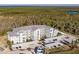 Aerial view of apartment building with parking at 14191 Heritage Landing Blvd # 1244, Punta Gorda, FL 33955