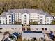 Aerial view of apartment building and parking at 14191 Heritage Landing Blvd # 1244, Punta Gorda, FL 33955