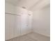 Spacious bedroom with double doors and plush carpeting at 14191 Heritage Landing Blvd # 1244, Punta Gorda, FL 33955