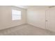 Bright bedroom with carpet flooring and a window with blinds at 14191 Heritage Landing Blvd # 1244, Punta Gorda, FL 33955