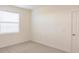 Simple bedroom with window, blinds, and carpet at 14191 Heritage Landing Blvd # 1244, Punta Gorda, FL 33955