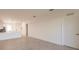 Bright living room with tile flooring and kitchen view at 14191 Heritage Landing Blvd # 1244, Punta Gorda, FL 33955