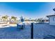 Community pool with lounge chairs and patio tables at 14191 Heritage Landing Blvd # 1244, Punta Gorda, FL 33955