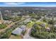 Aerial view of home situated on a canal with surrounding houses at 1572 Nimbus Dr, North Port, FL 34287