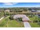 Single-Gathering home with canal views and lush landscaping at 1572 Nimbus Dr, North Port, FL 34287