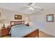 Bedroom with double closets and ceiling fan at 1572 Nimbus Dr, North Port, FL 34287