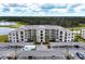 Aerial view of apartment building with covered parking at 18114 Gawthrop Dr # 404, Bradenton, FL 34211