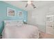 Spacious bedroom with a queen-size bed and ensuite bathroom at 18114 Gawthrop Dr # 404, Bradenton, FL 34211