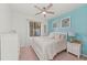 Cozy bedroom with a queen-size bed and window at 18114 Gawthrop Dr # 404, Bradenton, FL 34211