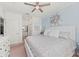 Spacious bedroom with king-size bed and ensuite bathroom at 18114 Gawthrop Dr # 404, Bradenton, FL 34211