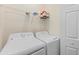 Bright laundry room with washer and dryer at 18114 Gawthrop Dr # 404, Bradenton, FL 34211