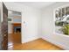 Bright bedroom with hardwood floors and view of fireplace at 202 27Th W St, Bradenton, FL 34205