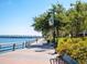 Scenic waterfront boardwalk with seating and bridge views at 202 27Th W St, Bradenton, FL 34205