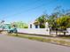 Charming bungalow home with white wall and blue door at 202 27Th W St, Bradenton, FL 34205