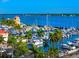 Aerial view of marina with many boats and waterfront restaurant at 202 27Th W St, Bradenton, FL 34205