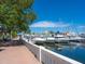 Brick walkway next to the marina with boats docked at 202 27Th W St, Bradenton, FL 34205