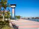 Riverwalk path with benches and view of marina at 202 27Th W St, Bradenton, FL 34205