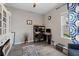 Bright home office features built-in shelving and hardwood floors at 2028 Woodleaf Hammock Ct, Bradenton, FL 34211