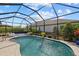 Refreshing pool in a screened enclosure, perfect for relaxation at 2028 Woodleaf Hammock Ct, Bradenton, FL 34211