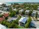 Aerial view of a two-story home near the beach with private pool at 203 72Nd St, Holmes Beach, FL 34217