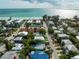 Aerial view of a charming two-story house close to beach at 203 72Nd St, Holmes Beach, FL 34217