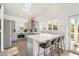 Modern kitchen with gray cabinets and island at 203 72Nd St, Holmes Beach, FL 34217