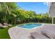 Inviting pool area with lounge chairs and putting green at 203 72Nd St, Holmes Beach, FL 34217