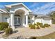 Front entrance with double doors and stone walkway at 2053 Rio De Janeiro Ave, Punta Gorda, FL 33983