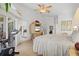 Large main bedroom with king-size bed and access to a private balcony at 2053 Rio De Janeiro Ave, Punta Gorda, FL 33983