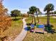 Paved pathway winds through Port Charlotte Beach Park, offering scenic waterfront views at 2053 Rio De Janeiro Ave, Punta Gorda, FL 33983