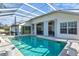 Enjoy this refreshing, screened-in pool with ample lounging space at 2053 Rio De Janeiro Ave, Punta Gorda, FL 33983