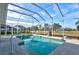 Inviting screened-in pool with plenty of space for lounging at 2053 Rio De Janeiro Ave, Punta Gorda, FL 33983