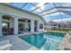 Enjoy this relaxing screened-in pool and spa area at 2053 Rio De Janeiro Ave, Punta Gorda, FL 33983