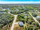 Aerial view of the house, showing its location in a residential area at 2133 Selover Rd, North Port, FL 34287