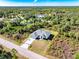 Aerial view of the house and surrounding neighborhood at 2133 Selover Rd, North Port, FL 34287