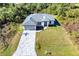 Aerial view of a new construction home with a gray roof at 2133 Selover Rd, North Port, FL 34287