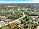 Aerial view of the house and its surroundings, showing the neighborhood at 2133 Selover Rd, North Port, FL 34287